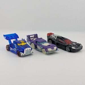 Hot Wheels Bundle of 3 – Rig Storm X-Raycers, Two Timer Night Storm, Race Car